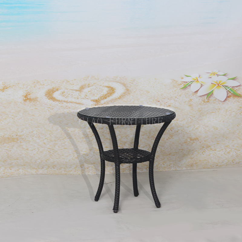 Round black rattan outdoor side table