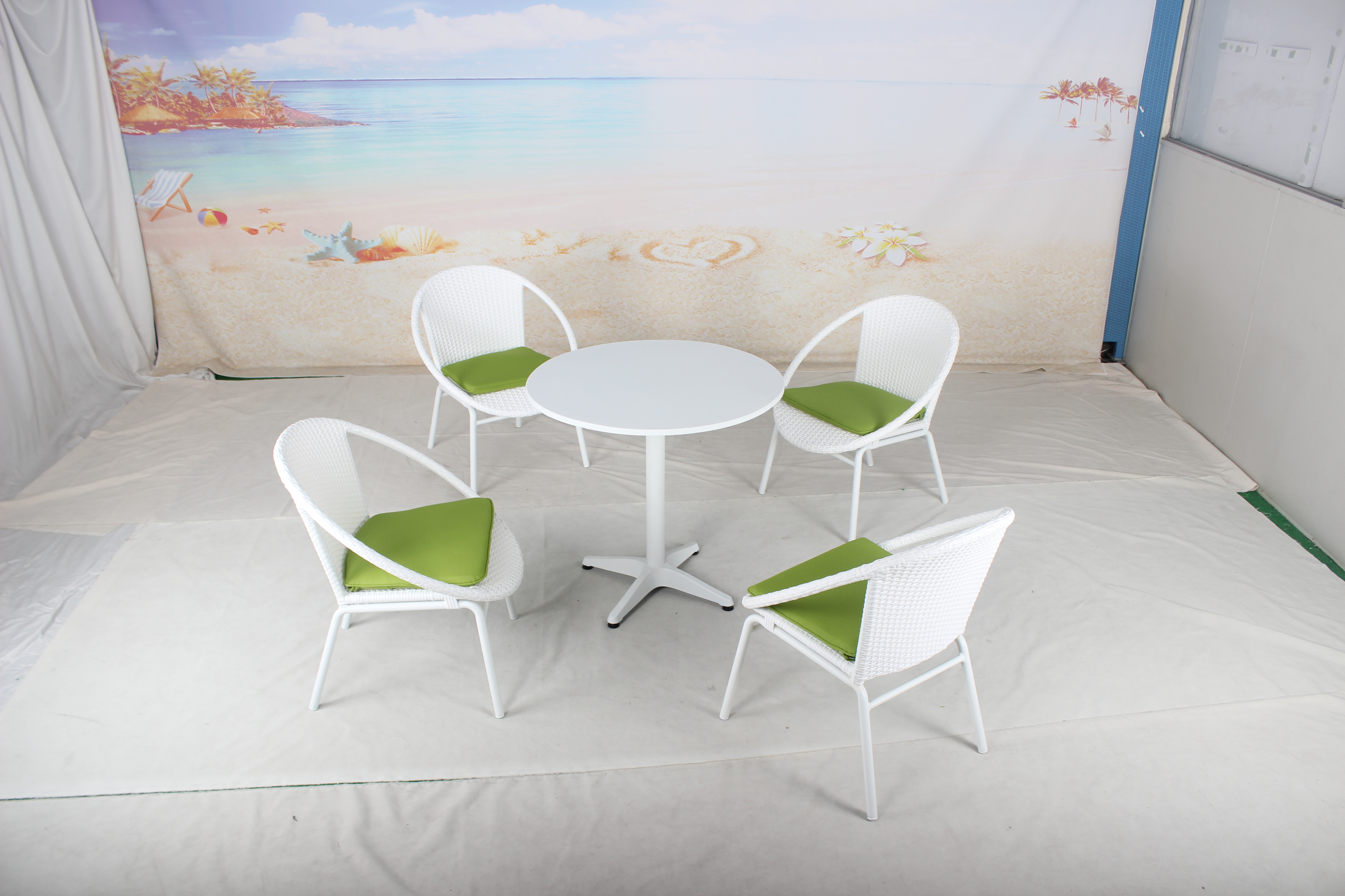 White terrace rattan chair and coffee table set 