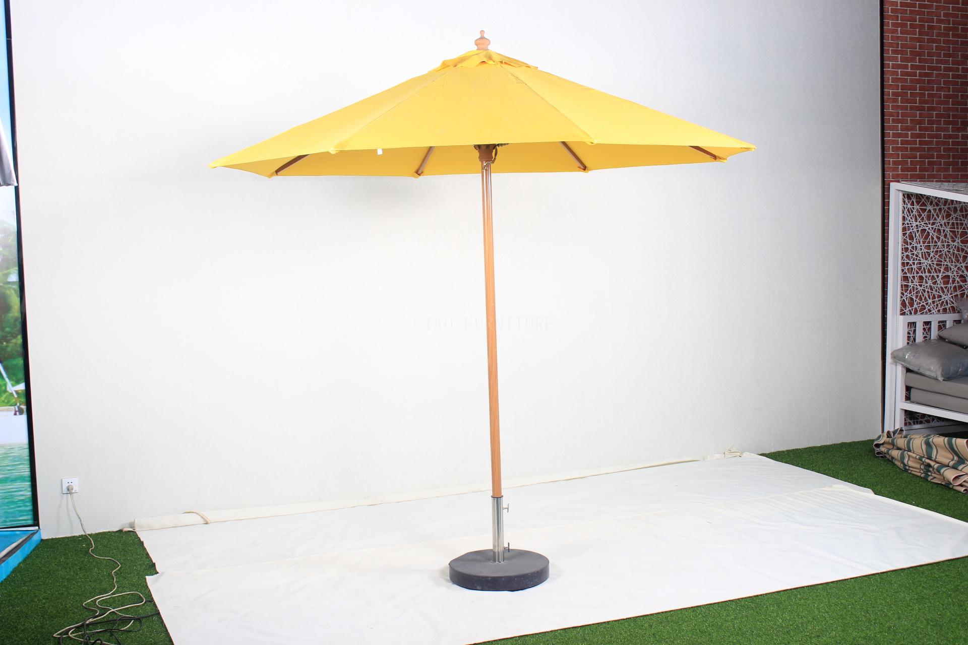 Big yellow garden parasol umbrella